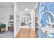 Inviting entryway with hardwood floors and a view into the bright, airy living room at 109 Hogan Glen Ct, Chapel Hill, NC 27516