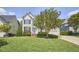 Traditional two-story home with lush green lawn and landscaping at 109 Hogan Glen Ct, Chapel Hill, NC 27516