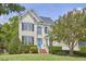 Beautiful two-story home with black shutters, well-maintained landscaping, and a bright blue front door at 109 Hogan Glen Ct, Chapel Hill, NC 27516