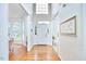 Grand foyer with high ceilings, hardwood floors, and plenty of natural light at 109 Hogan Glen Ct, Chapel Hill, NC 27516
