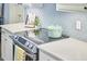 Modern kitchen with sleek appliances, quartz countertops, and chic tile backsplash at 109 Hogan Glen Ct, Chapel Hill, NC 27516