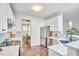 Bright kitchen featuring white cabinets, stainless appliances, and an open layout at 109 Hogan Glen Ct, Chapel Hill, NC 27516