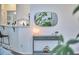 Stylish living area featuring modern console table, decor, and oval mirror at 109 Hogan Glen Ct, Chapel Hill, NC 27516