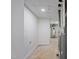 Utility room with water heater, HVAC, and painted concrete floor; bright and functional space at 109 Lochview Dr, Cary, NC 27518