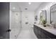 Modern bathroom with a glass-enclosed shower, double vanity, and contemporary design at 109 Lochview Dr, Cary, NC 27518