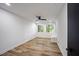 Bright bedroom with hardwood floors, recessed lighting, and natural light; cozy and inviting at 109 Lochview Dr, Cary, NC 27518