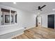 Spacious bedroom with hardwood floors, and large window seat storage; bright and inviting retreat at 109 Lochview Dr, Cary, NC 27518