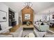 Bright living room features a brick fireplace, built-in shelving, and an open layout with modern furnishings at 109 Lochview Dr, Cary, NC 27518