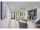 Modern living room with built-in bookshelves, hardwood floors, and natural light at 109 Lochview Dr, Cary, NC 27518