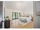 Bright main bedroom with vaulted ceilings, balcony access, and modern decor at 109 Lochview Dr, Cary, NC 27518