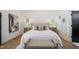 Bright main bedroom features hardwood floors, ensuite bathroom, and a large bed at 109 Lochview Dr, Cary, NC 27518