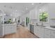 Open-concept kitchen flows seamlessly into the dining and living areas at 1095 Vauxhall Dr, Apex, NC 27502