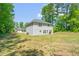 Two-story home boasts a spacious backyard surrounded by mature trees at 11 Mamie Ferguson Dr, Lillington, NC 27546