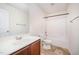 Bathroom featuring a vanity, mirror, toilet and a shower with a tub at 11 Mamie Ferguson Dr, Lillington, NC 27546