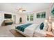 This is a staged bedroom featuring carpet floors and a window for natural light at 11 Mamie Ferguson Dr, Lillington, NC 27546