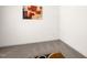 Bedroom features neutral walls and carpet, with a colorful artwork hanging above at 11 Mamie Ferguson Dr, Lillington, NC 27546