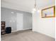 Bright dining area with carpet and a classic chandelier at 11 Mamie Ferguson Dr, Lillington, NC 27546