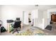 Spacious carpeted hallway with natural light and several doorways leading to other rooms in the home at 11 Mamie Ferguson Dr, Lillington, NC 27546