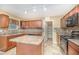 Cozy kitchen has a center island, tile backsplash, and pantry at 11 Mamie Ferguson Dr, Lillington, NC 27546