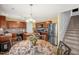 Kitchen with dark cabinets, stainless steel appliances and island seating at 11 Mamie Ferguson Dr, Lillington, NC 27546