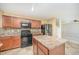 This kitchen boasts stainless appliances and a functional center island at 11 Mamie Ferguson Dr, Lillington, NC 27546