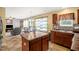 Kitchen featuring an island and open to living and dining areas at 11 Mamie Ferguson Dr, Lillington, NC 27546