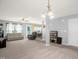 Open concept living area showcases neutral walls and lighting at 11 Mamie Ferguson Dr, Lillington, NC 27546