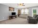 Living room featuring plush seating, a large window, and a television at 11 Mamie Ferguson Dr, Lillington, NC 27546