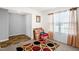 Bright living room with a window and modern neutral-tone decor at 11 Mamie Ferguson Dr, Lillington, NC 27546