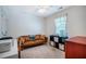 Bedroom featuring a leather sofa and a storage cube at 111 Florians Dr, Holly Springs, NC 27540