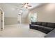 Spacious bedroom features neutral carpet, recessed lighting, and a ceiling fan at 112 Parkspring Ct, Cary, NC 27519