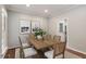 Formal dining room featuring a wood table and art at 112 Parkspring Ct, Cary, NC 27519