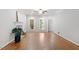 Bright living room with hardwood floors, fireplace and natural lighting at 112 Parkspring Ct, Cary, NC 27519