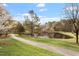 Picturesque pond with walking path at West Park community at 112 Parkspring Ct, Cary, NC 27519