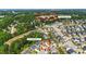 Aerial view showcasing home location, surrounding neighborhood, and proximity to Womble Park with baseball fields at 116 Chaseford Ct, Holly Springs, NC 27540