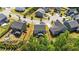 Aerial view of the neighborhood highlighting lush landscaping, well-kept yards and the layout of the cul-de-sac at 116 Chaseford Ct, Holly Springs, NC 27540