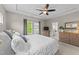 Relaxing bedroom featuring a comfortable bed, dresser, and an ensuite bathroom at 116 Chaseford Ct, Holly Springs, NC 27540