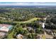 Expansive aerial view of home nestled near lush greenery and a meticulously manicured golf course at 116 Dallavia Ct, Morrisville, NC 27560