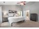 Spacious bedroom features vaulted ceilings, a ceiling fan, three windows, and neutral carpet at 116 Dallavia Ct, Morrisville, NC 27560