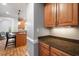 Well-designed kitchen featuring granite countertops and wood cabinets at 116 Dallavia Ct, Morrisville, NC 27560