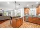 Open concept kitchen with island, stainless steel appliances, and granite countertops at 116 Dallavia Ct, Morrisville, NC 27560