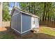Exterior view of the backyard shed featuring weatherboard siding, and white trim at 120 Foley Dr, Garner, NC 27529