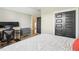 Comfortable bedroom with double door closet and an open door offering views of connecting rooms at 120 Mearleaf Pl, Holly Springs, NC 27540