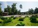 Allotment plots in the community garden offer residents space to grow their own food and enjoy the outdoors at 120 Mearleaf Pl, Holly Springs, NC 27540