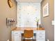 A stylish home office setup with a built-in desk and decorative accents at 120 Mearleaf Pl, Holly Springs, NC 27540
