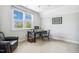 Bright office space featuring a large window and functional desk setup at 120 Mearleaf Pl, Holly Springs, NC 27540