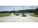 Community tennis courts and picnic tables offer residents an active and social outdoor recreation space at 120 Mearleaf Pl, Holly Springs, NC 27540