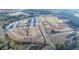 Aerial view of residential community showing a green space and new construction homes at 121 N Chubb Rdg, Wilson's Mills, NC 27520