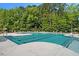 Exterior shot of a large community pool surrounded by lounge chairs at 121 N Chubb Rdg, Wilson's Mills, NC 27520
