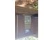 Backyard features partially shaded patio area and a brick exterior at 1222 Teakwood Pl, Raleigh, NC 27606